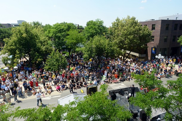 A large crowd gathers to watch Mitch Ryder perform during Sonic Lunch in downtown Ann Arbor on Thursday. A portion of E. Liberty St. was shut down to accommodate a large stage for the show. Melanie Maxwell I AnnArbor.com